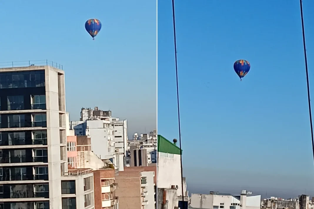 Globo aerostático de colores volando sobre el centro de Rosario