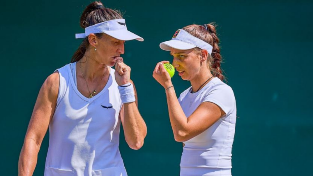 Nicole Fossa Huergo y Tamara Korpatsch en la cancha de Wimbledon